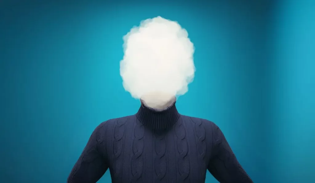 Person with a cloud for a head, symbolizing brain fog and waking tired after eight hours of sleep.